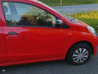 Gebraucht Daihatsu Cuore 70 PS (51 kW) 2008 Rot Kleinwagen