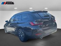 Gebraucht BMW 320e 163 PS (119 kW) 2022 Saphirschwarz Kombi