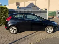 Gebraucht Ford Fiesta Titanium 95 PS (69 kW) 2010 Pantherschwarz metallic Kleinwagen