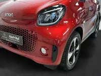 Gebraucht Smart ForTwo Electric Drive Passion 60 kW (82 PS) 2024 Bodypanels in carmine red (metal (metallic) Coupé