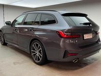 Gebraucht BMW 330e Advantage 292 PS (214 kW) 2021 Mineralgrau Kombi