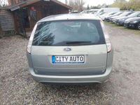 Second-hand Ford Focus Style 110 CP (80 kW) 2009 Auriu Break