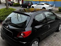 Gebraucht Peugeot 206+ 75 PS (55 kW) 2010 Schwarz Kleinwagen