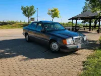 Używany Mercedes E230 132 KM (97 kW) 1990 Purpurowy Sedan/Limuzyna