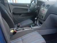 Second-hand Ford Focus Style 101 CP (74 kW) 2009 Albastru Berlinǎ