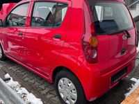 Gebraucht Daihatsu Cuore 70 PS (51 kW) 2009 Rot Kleinwagen