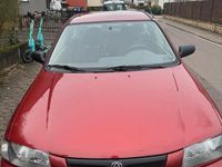Gebraucht Mazda 323 88 PS (64 kW) 1997 Rot Kleinwagen