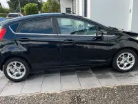 Gebraucht Ford Fiesta Titanium 95 PS (69 kW) 2012 Schwarz Limousine