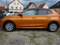 Gebraucht Skoda Fabia Selection 116 PS (85 kW) 2024 Phoenixorange metallic Kleinwagen