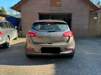 Używany Kia Ceed 99 KM (72 kW) 2014 Brązowy Hatchback