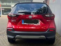 Gebraucht Honda Jazz Advance 122 PS (89 kW) 2023 Premium crystal red metallic (metallic) Kleinwagen