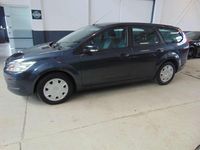 Gebraucht Ford Focus Style 101 PS (74 kW) 2010 Royalgrau met. Kombi