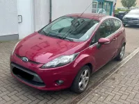Używany Ford Fiesta 80 KM (58 kW) 2012 Purpurowy Sedan/Limuzyna