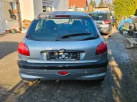 Używany Peugeot 206 75 KM (55 kW) 2001 Szary Sedan/Limuzyna