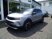 Gebraucht Opel Mokka Ultimate 131 PS (96 kW) 2021 Kontrast grau/quarz silber (metallic) SUV
