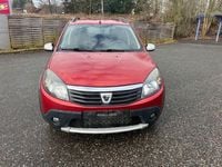 Second-hand Dacia Sandero Stepway 88 CP (64 kW) 2011 Roșu Berlinǎ