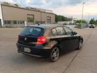 Gebraucht BMW 116 Performance 122 PS (89 kW) 2011 Schwarz Kleinwagen