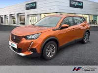 Gebraucht Peugeot e-2008 Active 100 kW (136 PS) 2021 Orange metallic (metallic) SUV