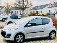 Gebraucht Peugeot 107 68 PS (50 kW) 2013 Silber Kleinwagen