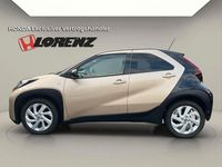 Gebraucht Toyota Aygo X Pulse 72 PS (52 kW) 2022 Gold schwarz metallic SUV