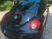 Gebraucht VW New Beetle 102 PS (75 kW) 2010 Schwarz Kleinwagen