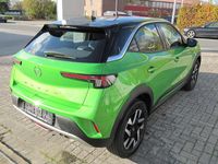 Gebraucht Opel Mokka Elegance 131 PS (96 kW) 2021 Matcha green/ikone gruen SUV