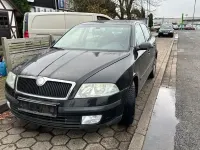 Używany Skoda Octavia Elegance 105 KM (77 kW) 2004 Czarny Sedan/Limuzyna