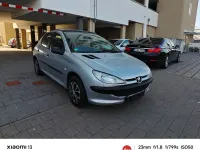 Używany Peugeot 206 60 KM (44 kW) 2000 Szary Sedan/Limuzyna