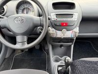 Gebraucht Toyota Aygo 68 PS (50 kW) 2007 Rot Kleinwagen