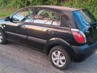 Second-hand Kia Rio 97 CP (71 kW) 2009 Negru Berlinǎ