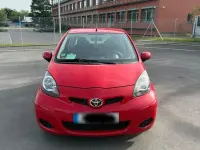 Gebraucht Toyota Aygo 68 PS (50 kW) 2010 Rot Kleinwagen