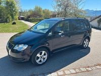 Second-hand VW Touran United 140 CP (102 kW) 2007 Negru Monovolum