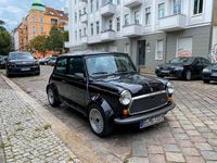 Second-hand Mini 1000 41 CP (30 kW) 1990 Negru Hatchback