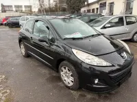Gebraucht Peugeot 207 73 PS (53 kW) 2011 Schwarz Kleinwagen