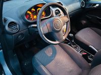 Używany Opel Corsa 80 KM (58 kW) 2009 Niebieski Hatchback