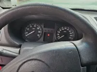 Używany Renault Clio II 58 KM (42 kW) 2010 Czerwony Sedan/Limuzyna