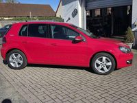 Gebraucht VW Golf VI Team 105 PS (77 kW) 2010 Rot Kleinwagen
