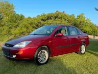 Occasion Ford Focus Ghia 101 ch (74 kW) 1999 Rouge Berline