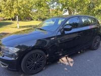 Second-hand BMW 116 122 CP (89 kW) 2010 Negru Hatchback
