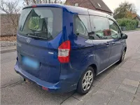 Gebraucht Ford Tourneo Courier 101 PS (74 kW) 2016 Blau Van / Kleinbus