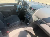 Używany VW Touran 105 KM (77 kW) 2011 Czarny Minivan