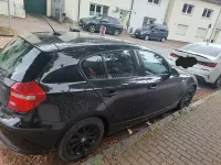 Second-hand BMW 116 122 CP (89 kW) 2009 Negru Hatchback