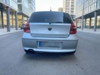 Second-hand BMW 116 122 CP (89 kW) 2009 Argintiu Hatchback