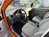 Używany VW Caddy Maxi 105 KM (77 kW) 2010 Pomarańczowy Minivan