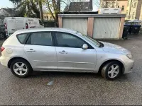 Używany Mazda 3 105 KM (77 kW) 2005 Srebrny Sedan/Limuzyna