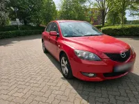 Używany Mazda 3 105 KM (77 kW) 2006 Czerwony Sedan/Limuzyna