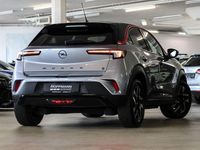 Gebraucht Opel Mokka-e GS Line 100 kW (136 PS) 2022 Kontrast grau/quarz silber SUV