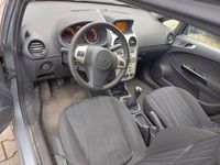 Usado Opel Corsa 80 HP (58 kW) 2007 Cinzento Sedan
