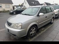 Gebraucht Kia Carens 113 PS (83 kW) 2006 Silber Van / Kleinbus