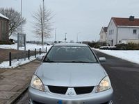 Second-hand Mitsubishi Lancer 98 CP (72 kW) 2007 Argintiu Berlinǎ